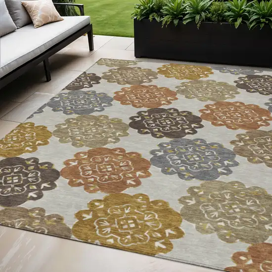 Taupe Orange And Ivory Quatrefoil Washable Indoor Outdoor Area Rug Photo 1