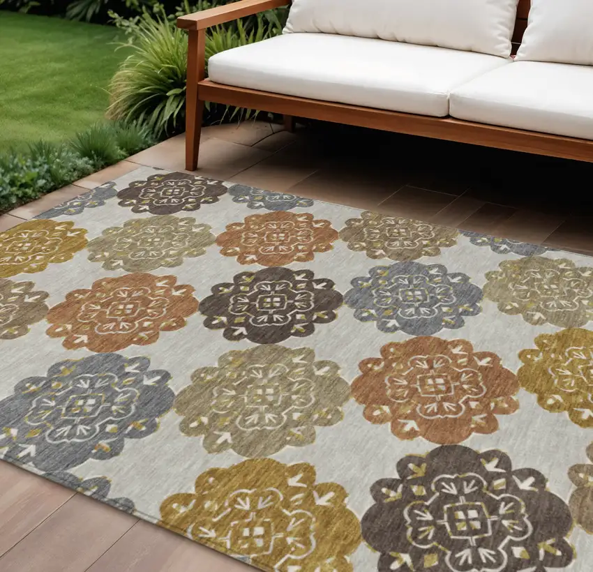 Taupe Orange And Ivory Quatrefoil Washable Indoor Outdoor Area Rug Photo 1