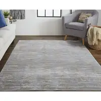 Photo of Taupe Silver And Tan Abstract Power Loom Area Rug
