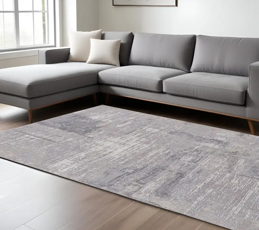 Tan and Blue Abstract Power Loom Distressed Area Rug Photo 1