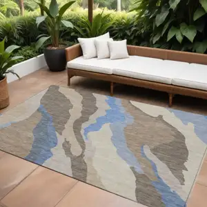 Photo of Taupe Tan And Blue Abstract Washable Indoor Outdoor Area Rug
