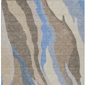 Photo of Taupe Tan And Blue Abstract Washable Indoor Outdoor Area Rug