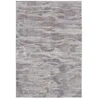 Photo of Taupe Tan And Orange Abstract Power Loom Distressed Stain Resistant Area Rug