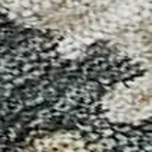 Photo of Taupe Teal And Pink Abstract Washable Area Rug With UV Protection