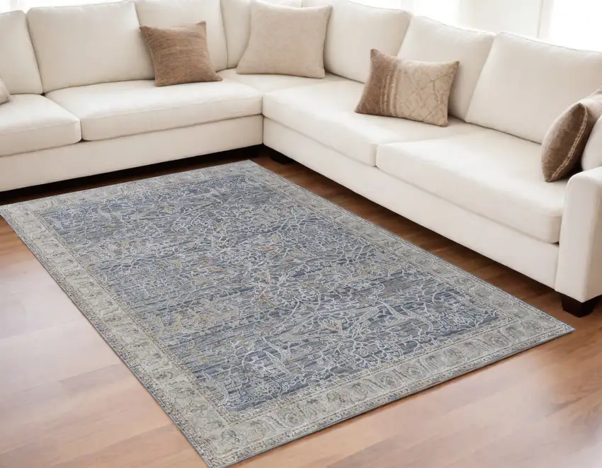 Taupe and Blue Ikat Power Loom Worn Faded Area Rug With Fringe Photo 1