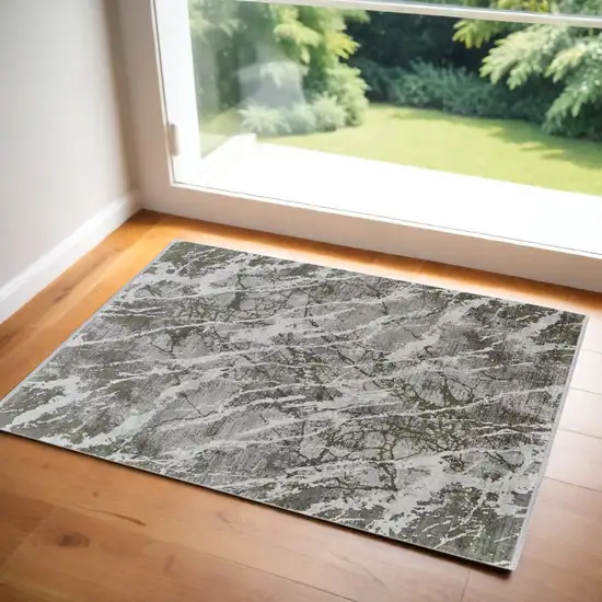 Taupe and Gray Abstract Power Loom Area Rug With Fringe Photo 1