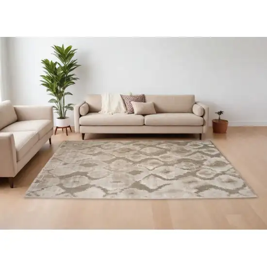 Taupe and Ivory Abstract Power Loom Worn Faded Area Rug Photo 1
