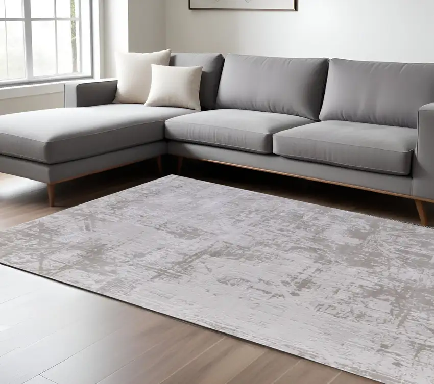 Taupe and Ivory Abstract Power Loom Worn Faded Area Rug Photo 1