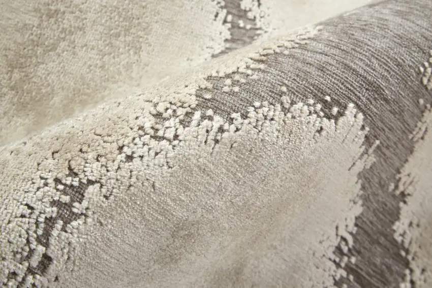 Taupe and Ivory Abstract Power Loom Worn Faded Area Rug Photo 9
