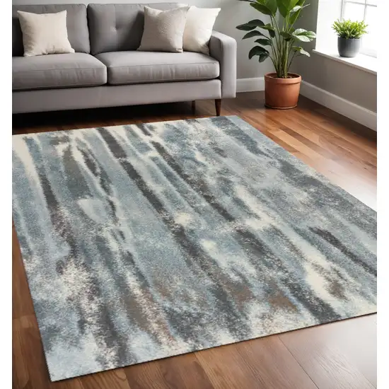 Teal Blue And White Abstract Area Rug Photo 1