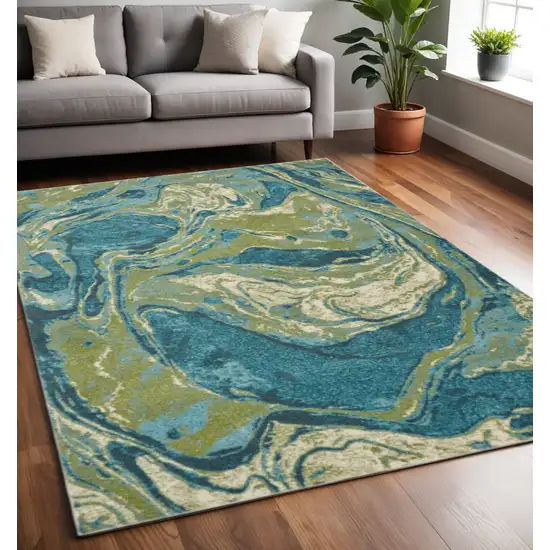 Teal And Beige Abstract Area Rug Photo 1