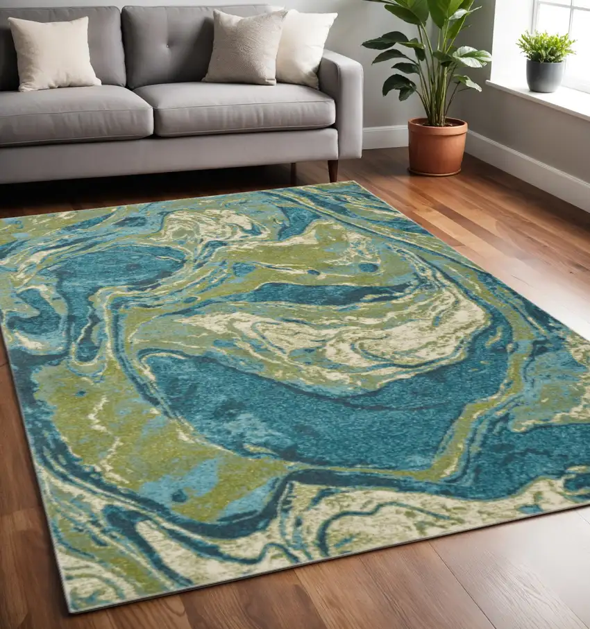 Teal And Beige Abstract Area Rug Photo 1
