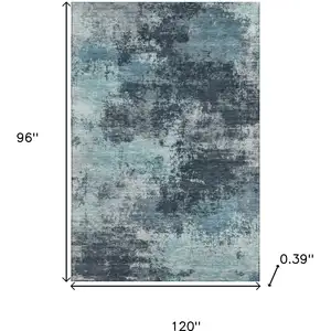 Photo of Teal And Aqua Abstract Washable Area Rug With UV Protection