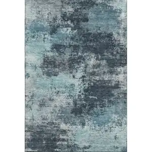 Photo of Teal And Aqua Abstract Washable Area Rug With UV Protection