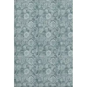 Photo of Teal And Aqua Floral Washable Area Rug With UV Protection