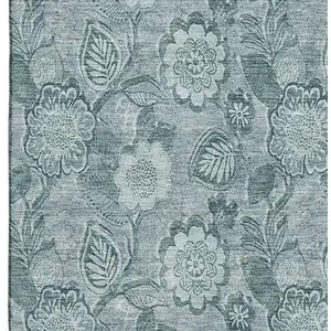 Photo of Teal And Aqua Floral Washable Area Rug With UV Protection