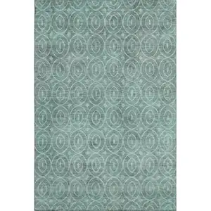Photo of Teal And Aqua Geometric Washable Area Rug With UV Protection