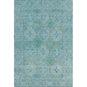 Photo of Teal And Aqua Oriental Washable Area Rug With UV Protection