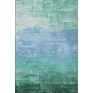 Photo of Teal And Aqua Striped Washable Area Rug With UV Protection