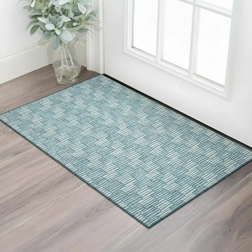 Teal And Beige Abstract Geometric Washable Area Rug With UV Protection Photo 1