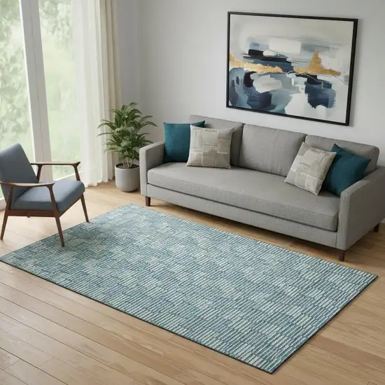 Teal And Beige Abstract Geometric Washable Area Rug With UV Protection Photo 1