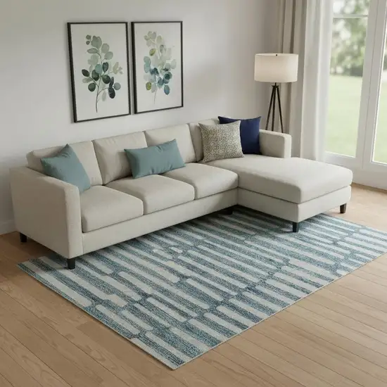 Teal And Beige Abstract Geometric Washable Area Rug With UV Protection Photo 1