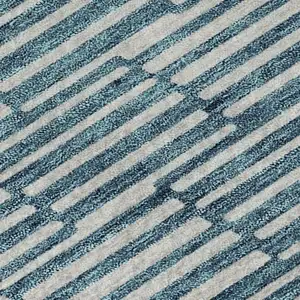 Photo of Teal And Beige Abstract Geometric Washable Area Rug With UV Protection