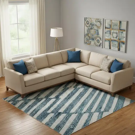 Teal And Beige Abstract Geometric Washable Area Rug With UV Protection Photo 1