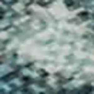 Photo of Teal And Beige Abstract Washable Area Rug With UV Protection