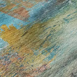 Photo of Teal And Beige Abstract Washable Area Rug With UV Protection