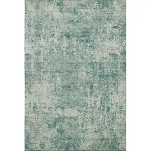 Photo of Teal And Beige Abstract Washable Area Rug With UV Protection