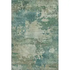 Photo of Teal And Beige Abstract Washable Area Rug With UV Protection