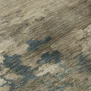 Photo of Teal And Beige Abstract Washable Area Rug With UV Protection