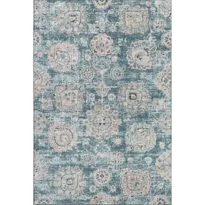 Photo of Teal And Beige Floral Washable Area Rug With UV Protection