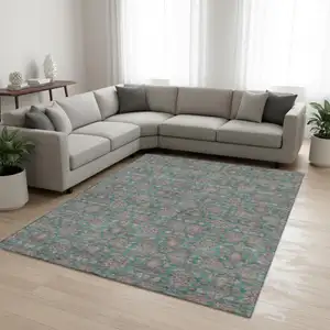 Photo of Teal And Beige Floral Washable Area Rug With UV Protection
