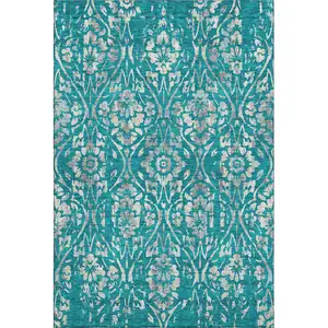 Photo of Teal And Beige Floral Washable Area Rug With UV Protection
