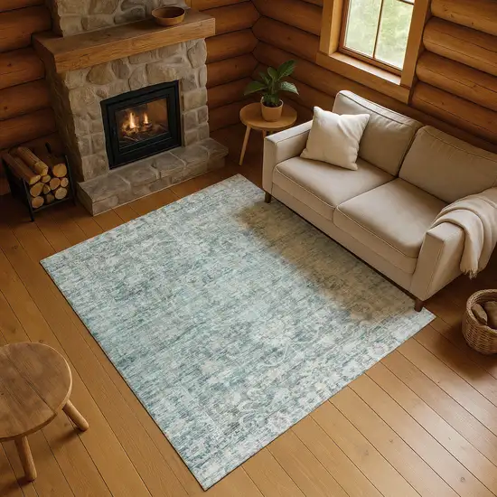 Teal And Beige Oriental Washable Area Rug With UV Protection Photo 4