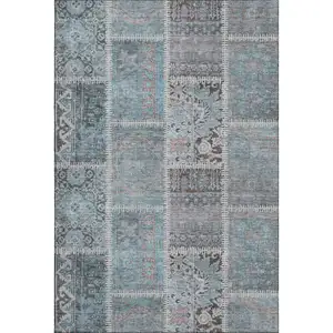 Photo of Teal And Beige Patchwork Washable Area Rug With UV Protection