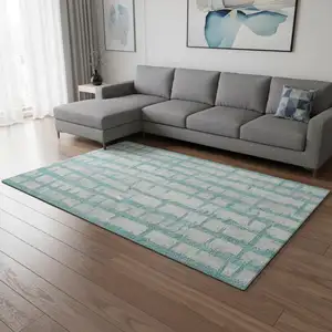Photo of Teal And Beige Striped Washable Area Rug With UV Protection