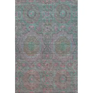 Photo of Teal And Blush Medallion Washable Area Rug With UV Protection