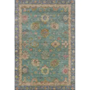 Photo of Teal And Blush Oriental Washable Area Rug With UV Protection