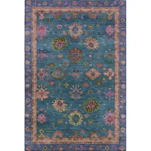 Photo of Teal And Blush Oriental Washable Area Rug With UV Protection