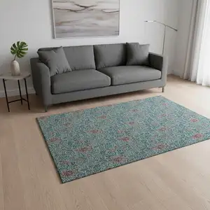 Photo of Teal And Brown Floral Washable Area Rug With UV Protection