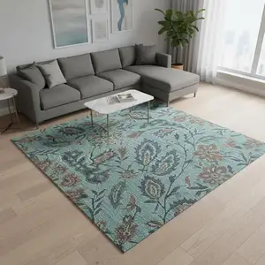 Photo of Teal And Brown Floral Washable Area Rug With UV Protection