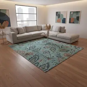 Photo of Teal And Brown Floral Washable Area Rug With UV Protection