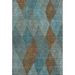 Photo of Teal And Brown Geometric Washable Area Rug With UV Protection