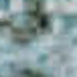 Photo of Teal And Brown Geometric Washable Area Rug With UV Protection