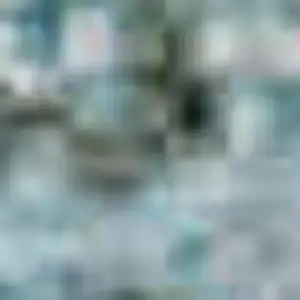 Photo of Teal And Brown Geometric Washable Area Rug With UV Protection