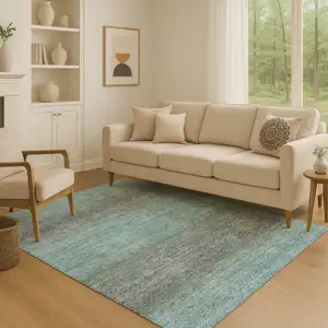Photo of Teal And Brown Geometric Washable Area Rug With UV Protection