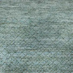 Photo of Teal And Brown Geometric Washable Area Rug With UV Protection